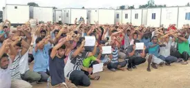  ??  ?? Refugees on Manus Island in Papua New Guinea.