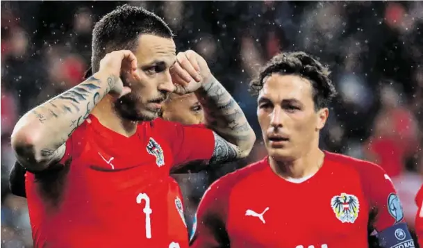  ?? BILD: SN/GEPA PICTURES ?? Die Kritiker verstummen lassen hat Marko Arnautovic (links, mit Julian Baumgartli­nger) mit seinen zwei Toren gegen Lettland.