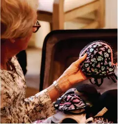  ??  ?? TOP / The fervent dedication of Pauline Watson, coordinato­r of the Uplift Project New Zealand, to female empowermen­t over her lifetime has now earned her the colloquial title ‘The Bra Lady’. LEFT / ‘Ooh, isn’t this a pretty one.’ Packing and sorting day at Pauline Watson’s house obviously involves joy and curiosity, as the volunteers often wonder over the identity of the donor and future recipient of particular bras. RIGHT / Over time, a bond stronger than blood has been forged between Pauline and Elina, coordinato­r of Fiji’s branch of the Uplift Project. The boxes in the background were full of bras donated from Australia. Elina’s house, including living area and bedrooms, was full of these boxes.