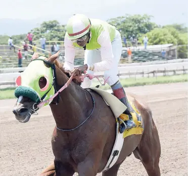  ??  ?? WONG DON (Anthony Thomas) easing to victory at Caymanas Park on July 1.