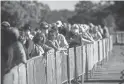  ?? ANDREW WEST/THE FORT MYERS NEWS-PRESS ?? People line up for COVID-19 vaccines at a vaccinatio­n site in Fort Myers, Fla.