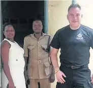  ??  ?? HAPPY TO HELP Sergeant Jim Thomson in Malawi
