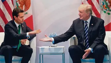  ?? AFP ?? Donald Trump traf Mexikos Staatschef Enrique Peña Nieto am Rande des G-20-Gipfels in Hamburg.