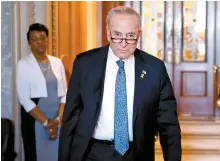  ?? AFP-Yonhap ?? Senate Majority Leader Chuck Schumer (D-NY) departs from the Senate Chambers in the U.S. Capitol Building, Washington, D.C., Thursday.