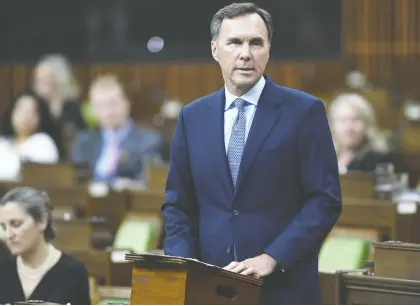  ?? ADRIAN WYLD/THE CANADIAN PRESS ?? Finance Minister Bill Morneau has shown a preference to increasing discretion­ary spending as a solution, says Kevin Carmichael. Yet Carmichael notes that for now, Morneau has earned the benefit of the doubt because his rescue effort appears to be working.