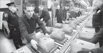  ??  ?? TRYING TO KEEP UP: Rapid shipments of packages containing Vault Bricks loaded with valuable .999 solid U.S. State Silver Bars are flowing around the clock from the private vaults of the Federated Mint to U.S. State residents who call 1-888-282-6742 to beat the 48-hour deadline.