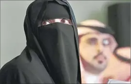  ?? Carolyn Cole Los Angeles Times ?? ONE OF the few female journalist­s in Riyadh attends a news conference. Though more Saudi women are entering the workforce, they still face many challenges.
