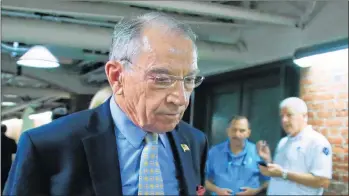  ??  ?? Senate Judiciary Committee Chairman Sen. Chuck Grassley, R-Iowa, walks through a tunnel towards the Dirksen Senate Building on Capitol Hill in Washington Wednesday.