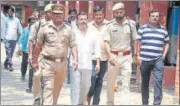  ?? HT PHOTO ?? Ashish Mishra, main accused in the Lakhimpur violence case and Union minister Ajay Mishra’s son, being produced in a local court in Lakhimpur on Tuesday.