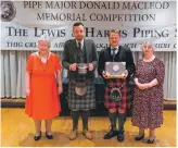  ?? Photograph: Lewis and Harris Piping Society. ?? James Duncan Mackenzie, second left, and Calum Beaumont with Susan Millar, left, and Fiona MacLeod, daughters of P/M Donald MacLeod.