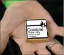  ?? ?? The Canadian Press
Cocaine from a safe supply being handed out to drug users by the Vancouver Area Network of Drug Users.