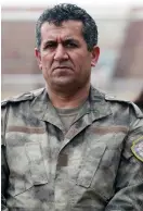  ?? (Rodi Said/Reuters) ?? SIYAMAND WALAT, general commander of the self-defense forces of the Kurdishled Syrian north, poses yesterday in the town of Hasaka.