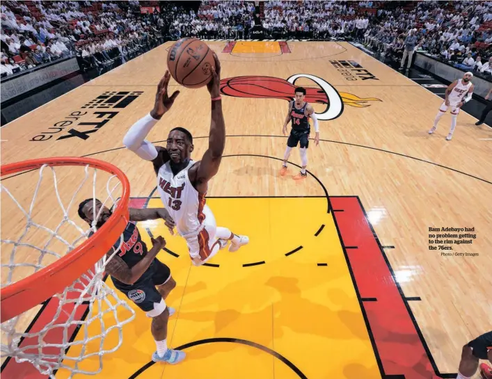  ?? Photo / Getty Images ?? Bam Adebayo had no problem getting to the rim against the 76ers.