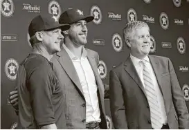  ?? Karen Warren / Houston Chronicle ?? Astros manager A.J. Hinch, from left, pitcher Justin Verlander and general manager Jeff Luhnow hope to smile all the way through October.