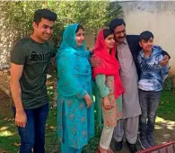  ??  ?? Malala and her family recently travelled back to Pakistan for the first time since she was shot.