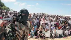  ?? THE ASSOCIATED PRESS FILE ?? The defections of two American Islamic extremist fighters in Somalia highlight tensions within al-Shabab over whether it should remain affiliated to al-Qaida or switch allegiance to ISIL.