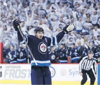  ?? JOHN WOODS/THE CANADIAN PRESS ?? Mark Scheifele and the Jets treated Winnipeg to a playoff win Wednesday.