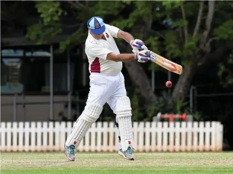  ?? Photos: Kevin Farmer ?? TOP SHOT: Toowoomba Grey Cavaliers batsman Ian Reimers plays a shot during his side’s over-60s match against Sunshine Coast.