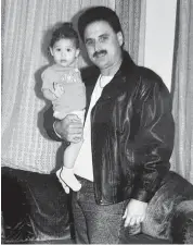  ?? Obtained by the Miami Herald ?? Heriberto Delvalle with his toddler, Barbara, in the early ’90s.