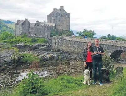  ??  ?? The family in a photograph taken at Eilean Donan Castle where the camera went missing.