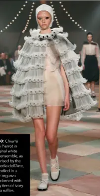  ??  ?? Look 40: Chiuri’s take on Pierrot in his original white baggy ensemble, as popularise­d by the Commedia dell’arte, is embodied in a double-organza dress adorned with dreamy tiers of ivory organza ruffles.