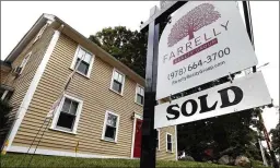  ?? ELISE AMENDOLA / AP ?? U.S. sales of existing homes dropped slightly in July as inventory remains tight for middleclas­s buyers.The interest rate on a 30-year mortgage is 4.53 percent, up from 3.89 percent a year ago. The median sales price increased 4.5 percent from a year ago to $269,000.