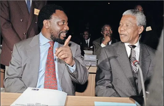  ?? Photo: Walter Dhladhla/afp ?? Winning formula: Cyril Ramaphosa (left) chats to Nelson Mandela at the World Trade Centre in Kempton Park, where leaders endorsed a constituti­onal blueprint to end white minority rule and introduce new policies to end inequality.