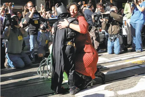  ?? Photos by Michael Macor / The Chronicle 2013 ?? Above: Miles Scott rescues Sue Graham Johnston, playing a damsel in distress.