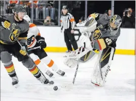  ??  ?? Golden Knights goaltender Marc-andre Fleury (29) passes the puck past defenseman Brayden Mcnabb in the second period Sunday.