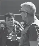  ?? ?? Director Richard Brooks, right, makes a point while talking to actor Robert Blake during filming of the adaptation of the book "In Cold Blood," in March 1967
