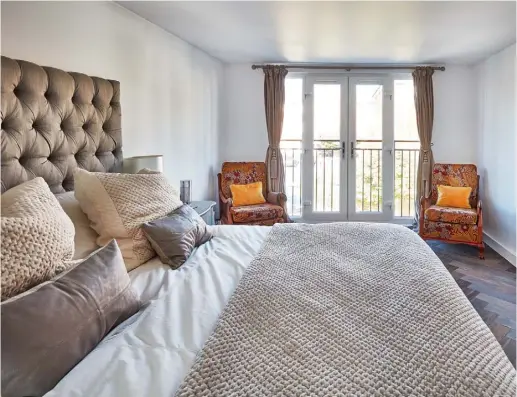  ??  ?? MAIN
BEDROOM
On the extended top floor of the house, floor-to-ceiling doors lead to a Juliet balcony that looks out over the garden