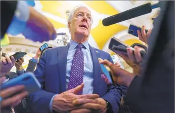  ?? J. Scott Applewhite Associated Press ?? SEN. JOHN CORNYN aims to distinguis­h himself after previously serving as No. 2 to Republican leader Mitch McConnell — who faced growing criticism from GOP colleagues and just announced he’s stepping down.