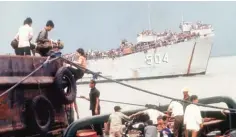  ?? PHOTOS COURTESY: NAYAN CHANDA ?? Vietnamese civilians fleeing from Danang, fallen to the North Vietnamese Communist army, arrive at Vung Tau port near Saigon in April 1975