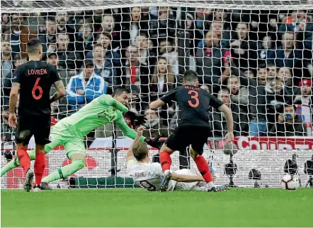  ?? AP ?? Harry Kane scores England’s second goal during the Uefa Nations League football match against Croatia at Wembley Stadium yesterday.