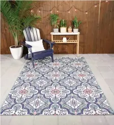  ?? PHOTO cOuRTESy HOmEDEpOT.cOm ?? CLASSIC PATTERN: Home Depot’s Star Moroccan indoor/ outdoor rug features a tilework design.