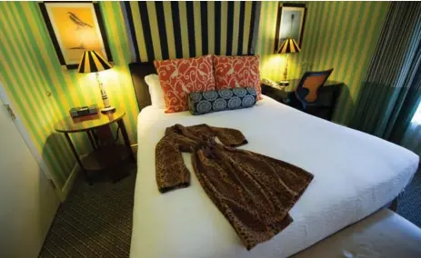  ?? DAVID PAUL MORRIS/BLOOMBERG ?? Gone are the days of plain, one-size-fits-all hotel bathrobes. Hotel chains are bringing in funky robes with eye-catching prints in a new marketing strategy.