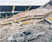  ??  ?? BAJO ESCOMBROS Varios edificios en Jojutla se vinieron abajo luego del sismo que tuvo su epicentro en Axochiapan