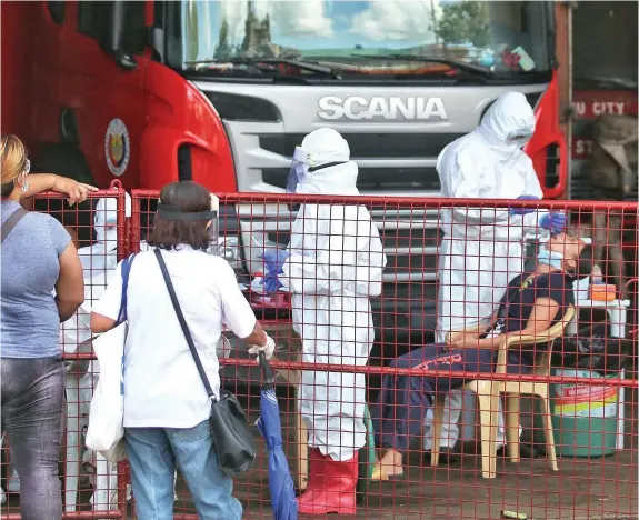  ??  ?? Personnel of Parian Fire Sub-Station in Cebu City undergo swab testing yesterday. ALDO NELBERT BANAYNAL