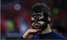  ?? Photograph: Kieran McManus/REX/Shuttersto­ck ?? Joško Gvardiol of Croatia wearing a face mask to protect his broken nose during a FIFA World Cup 2022 match in Qatar.