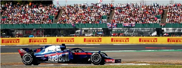  ?? GETTY IMAGES ?? Brendon Hartley driving the Scuderia Toro Rosso on the track during the British Grand Prix. Hartley had to withdraw on the first lap.