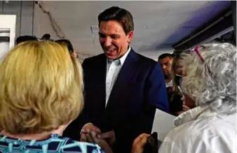  ?? CHARLES KRUPA/ASSOCIATED PRESS ?? The New Hampshire Federation of Republican Women voiced displeasur­e with Florida Governor Ron DeSantis for scheduling a Tuesday campaign event that coincides with their sold-out luncheon featuring former president Donald Trump.