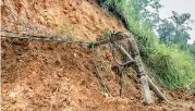  ??  ?? Landslide in Galle. Pix by Sirangika Lokukarawi­ta and Sarath Siriwarden­e