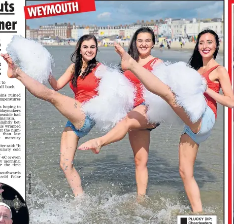  ??  ?? WEYMOUTH ®Ê PLUCKY DIP: Cheerleade­rs brave the cold sea, while a family ignore the rain to stroll on the beach