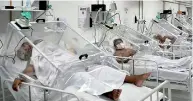  ?? (DM) ?? COVID-19 patients are treated inside a non-invasive ventilatio­n system named the ‘Vanessa Capsule’ at a municipal field hospital in Brazil