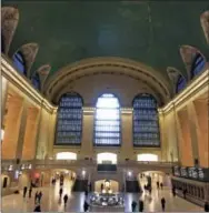  ?? DONALD KING — THE ASSOCIATED PRESS ?? This photo shows the interior of Grand Central Terminal in New York with the constellat­ions from the zodiac designed into the ceiling. If you’re a transporta­tion buff, New York City is the perfect destinatio­n.