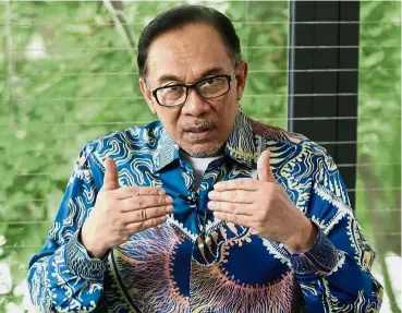  ??  ?? Keeping a level head: Anwar urged the public to study more closely PKR’s stand on the Bill to amend Act 355.