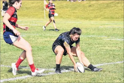  ?? SUBMITTED PHOTO ?? Alysha Corrigan, right, of the Charlottet­own Rugby Football Club is pictured in action with the club versus the Truro Saints in Nova Scotia senior women’s rugby league action last summer.