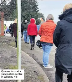  ??  ?? Queues form at a vaccinatio­n centre in Willerby Hill