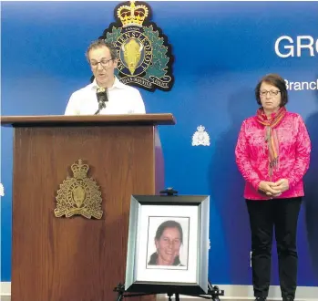  ?? KIM BOLAN/VANCOUVER SUN ?? ‘We’re suffering,’ said Peter Ladner, left, at an RCMP press conference Friday, announcing a $30,000 reward for informatio­n on the April 3, 2009 murder of his sister Wendy Ladner-Beaudry, shown in framed photo.