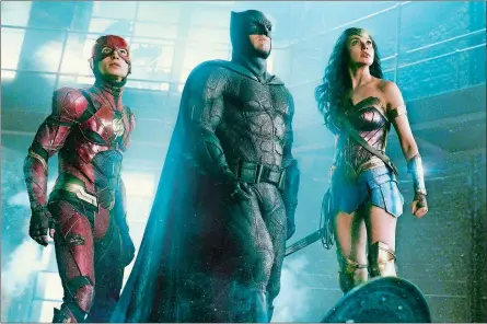  ?? WARNER BROS. PICTURES ?? Ezra Miller as The Flash, Ben Affleck as Batman and Gal Gadot as Wonder Woman in the film “Justice League.”